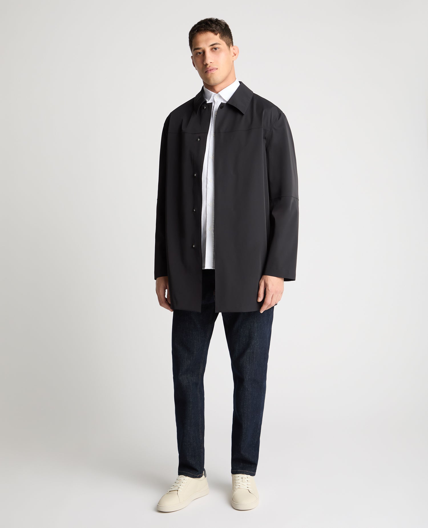 Man wearing a navy jacket