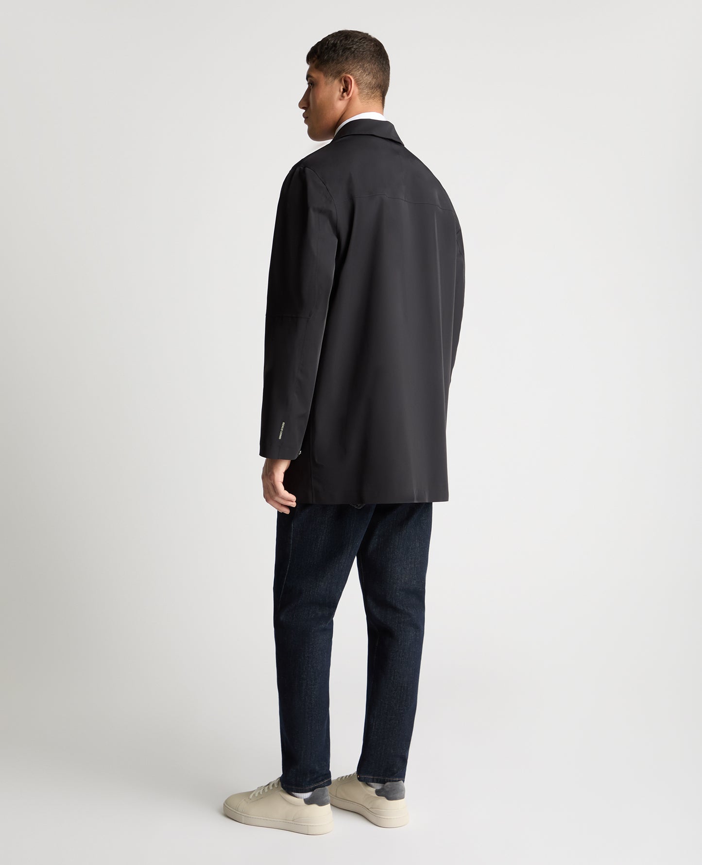 Man wearing a navy jacket