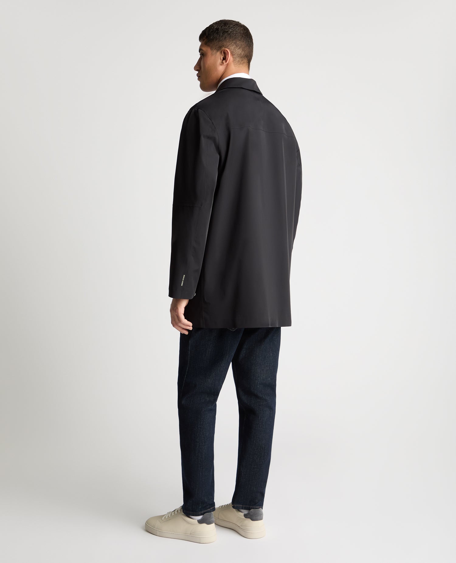 Man wearing a navy jacket
