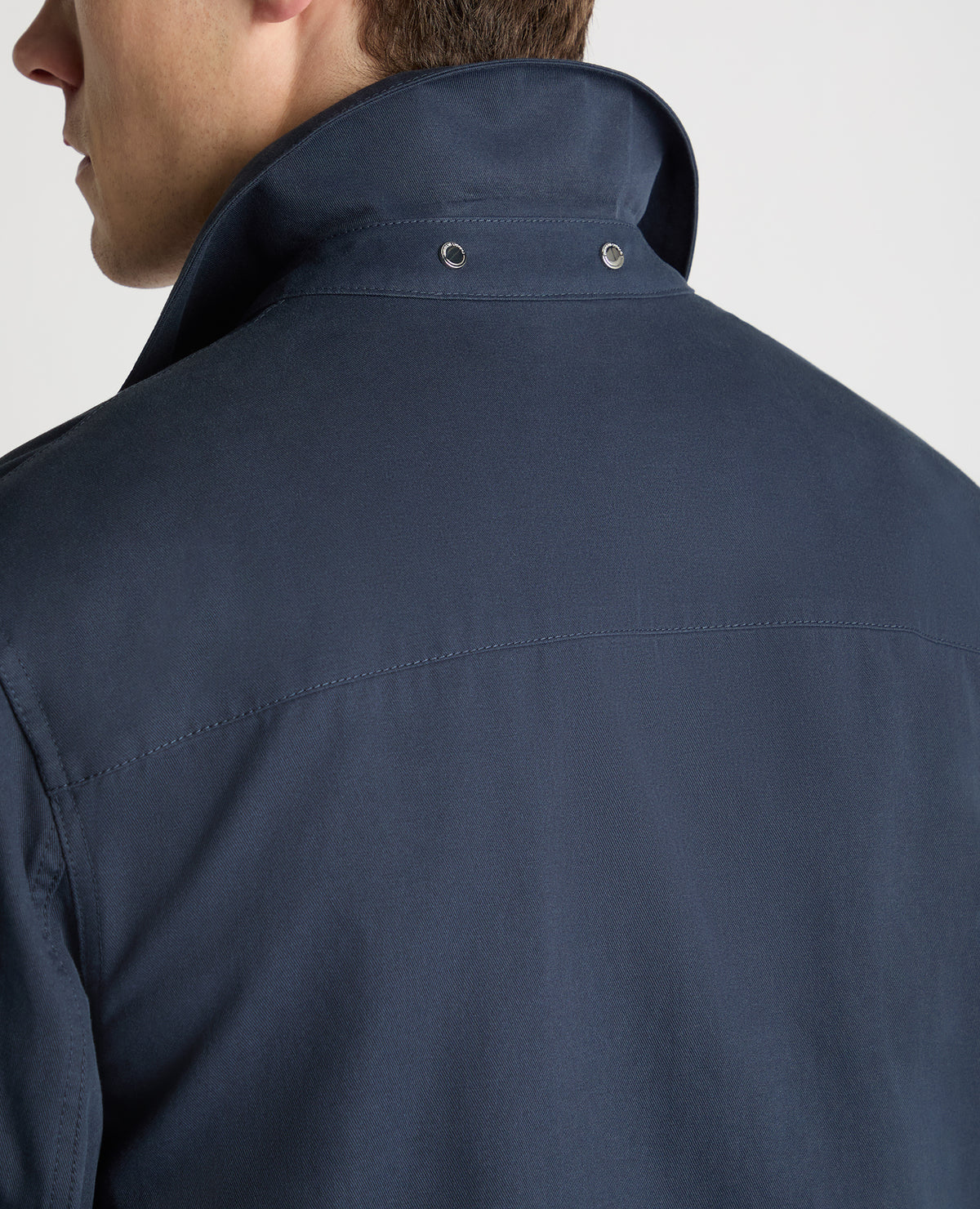 Man wearing a blue jacket