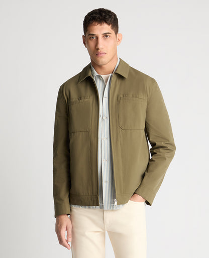 Man wearing a green jacket