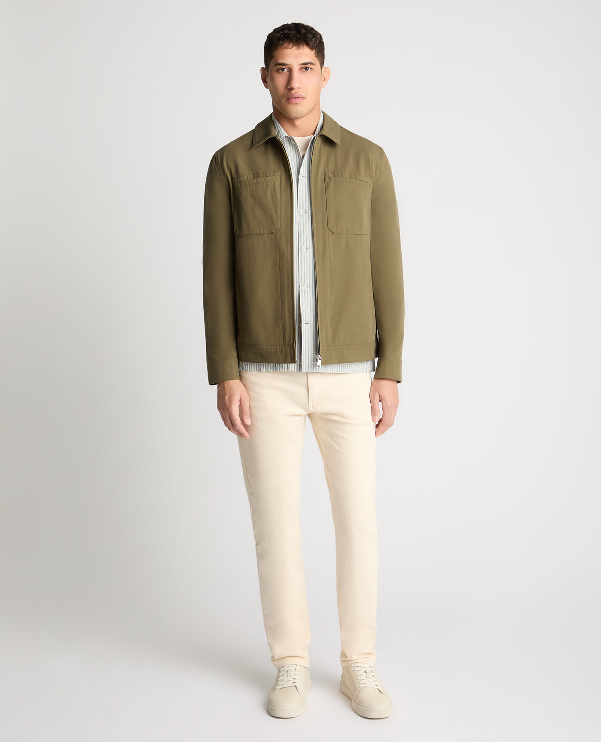 Man wearing a green jacket
