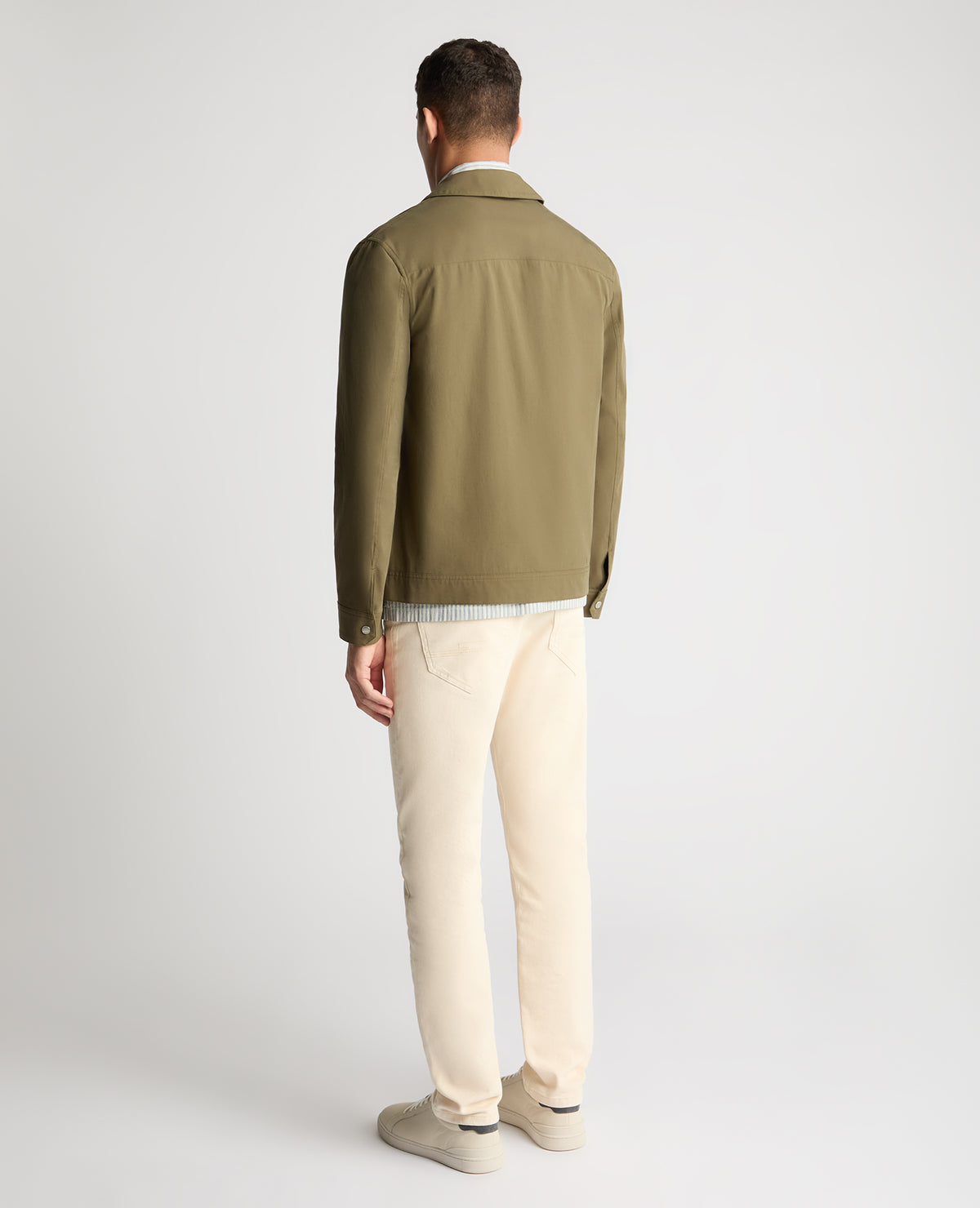 Man wearing a green jacket