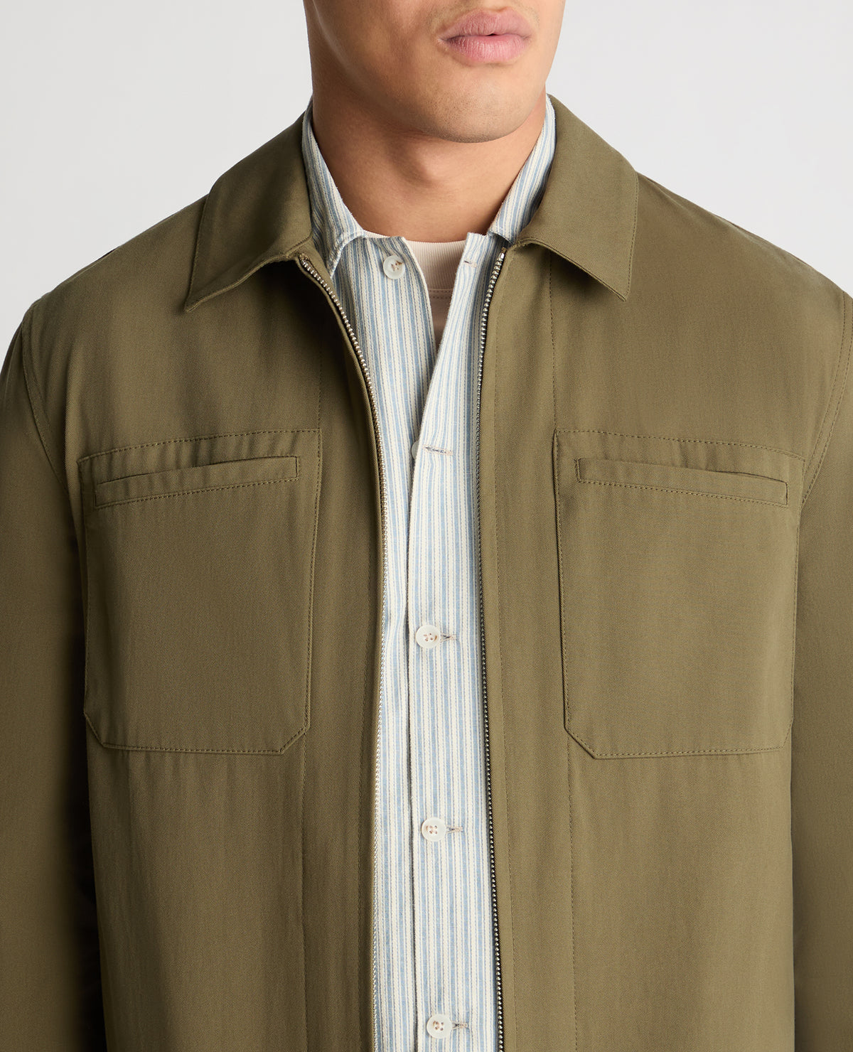 Man wearing a green jacket