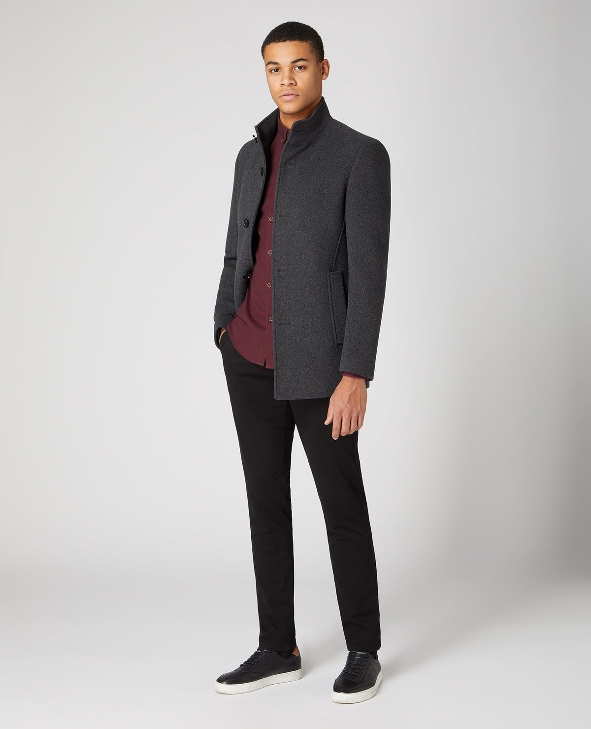 Man wearing a grey Tapered Fit Wool-Rich Overcoat