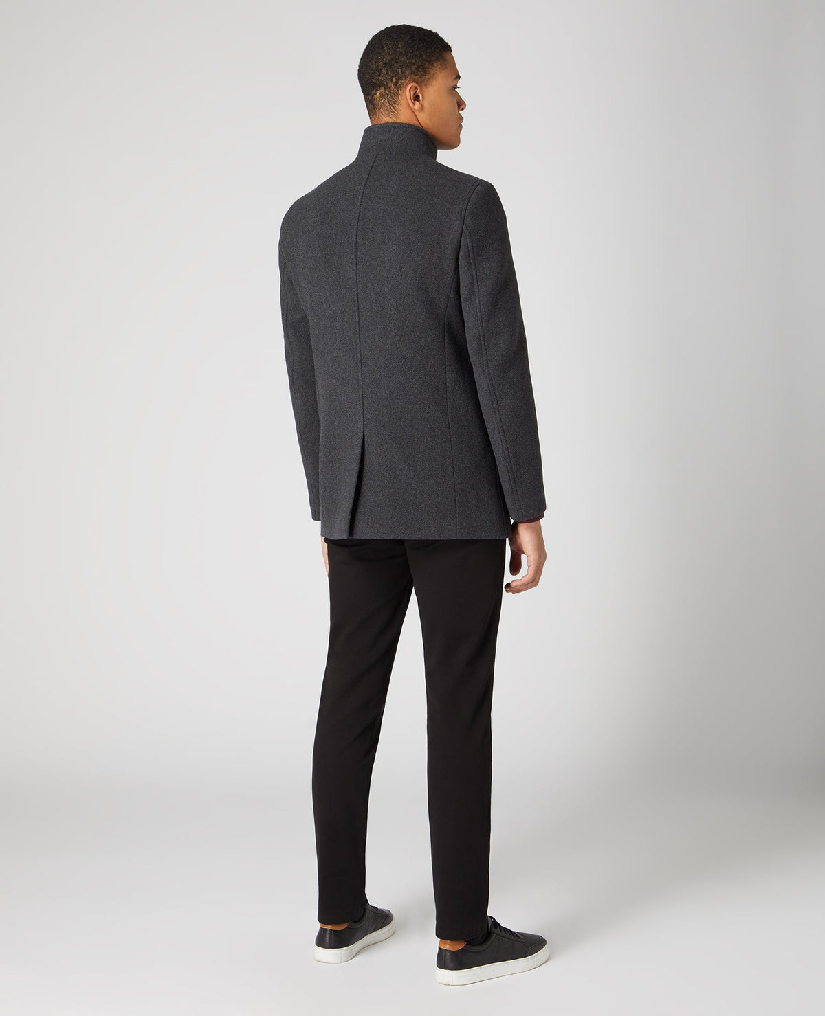 Man wearing a grey Tapered Fit Wool-Rich Overcoat