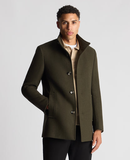 Man wearing a green Tapered Fit Wool-Blend Overcoat