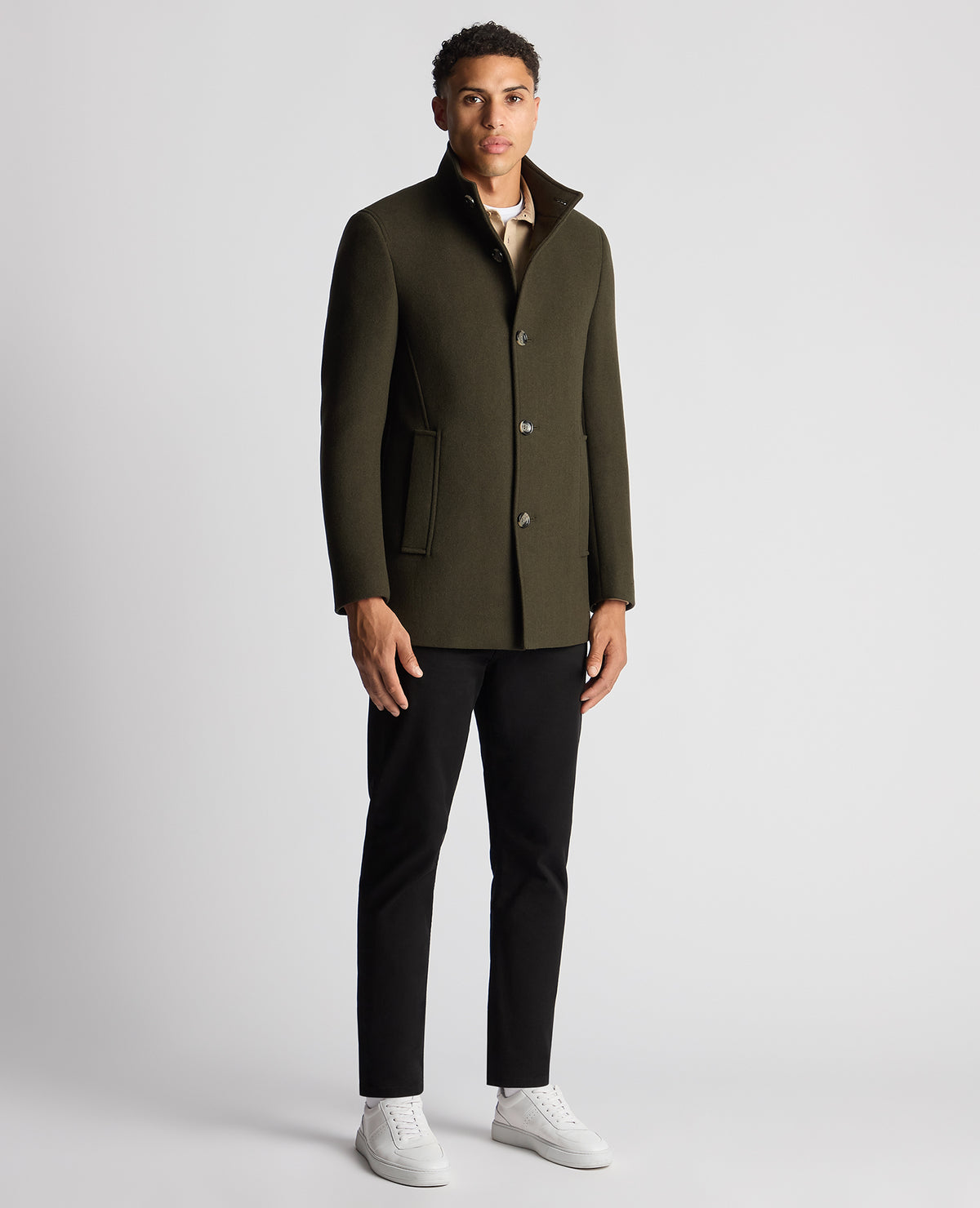 Man wearing a green Tapered Fit Wool-Blend Overcoat