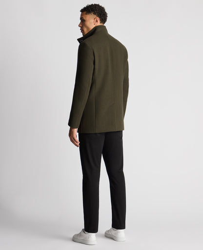 Man wearing a green Tapered Fit Wool-Blend Overcoat