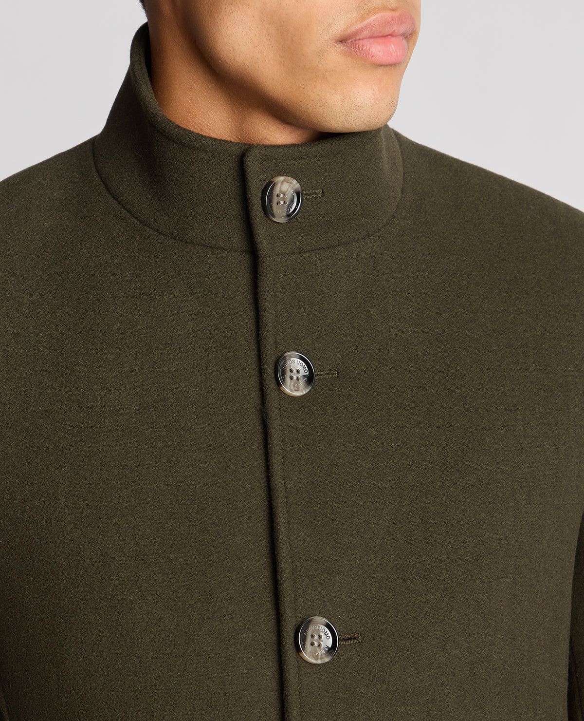 Man wearing a green Tapered Fit Wool-Blend Overcoat