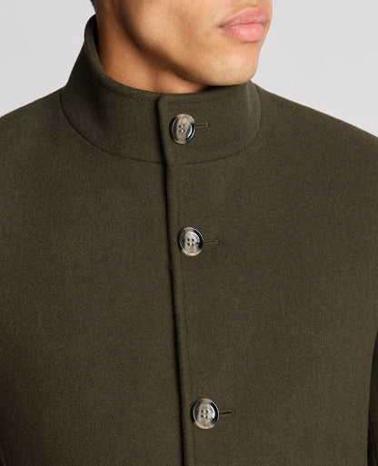 Man wearing a green Tapered Fit Wool-Blend Overcoat