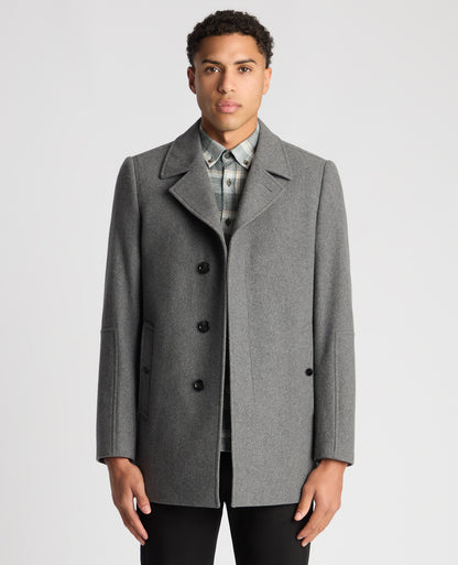 Man wearing a grey Tailored Fit Overcoat