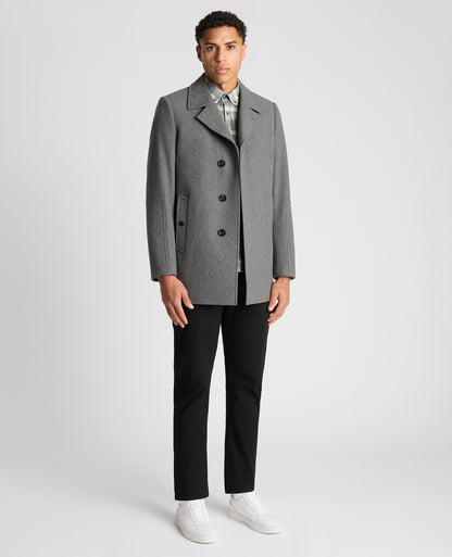 Man wearing a grey Tailored Fit Overcoat