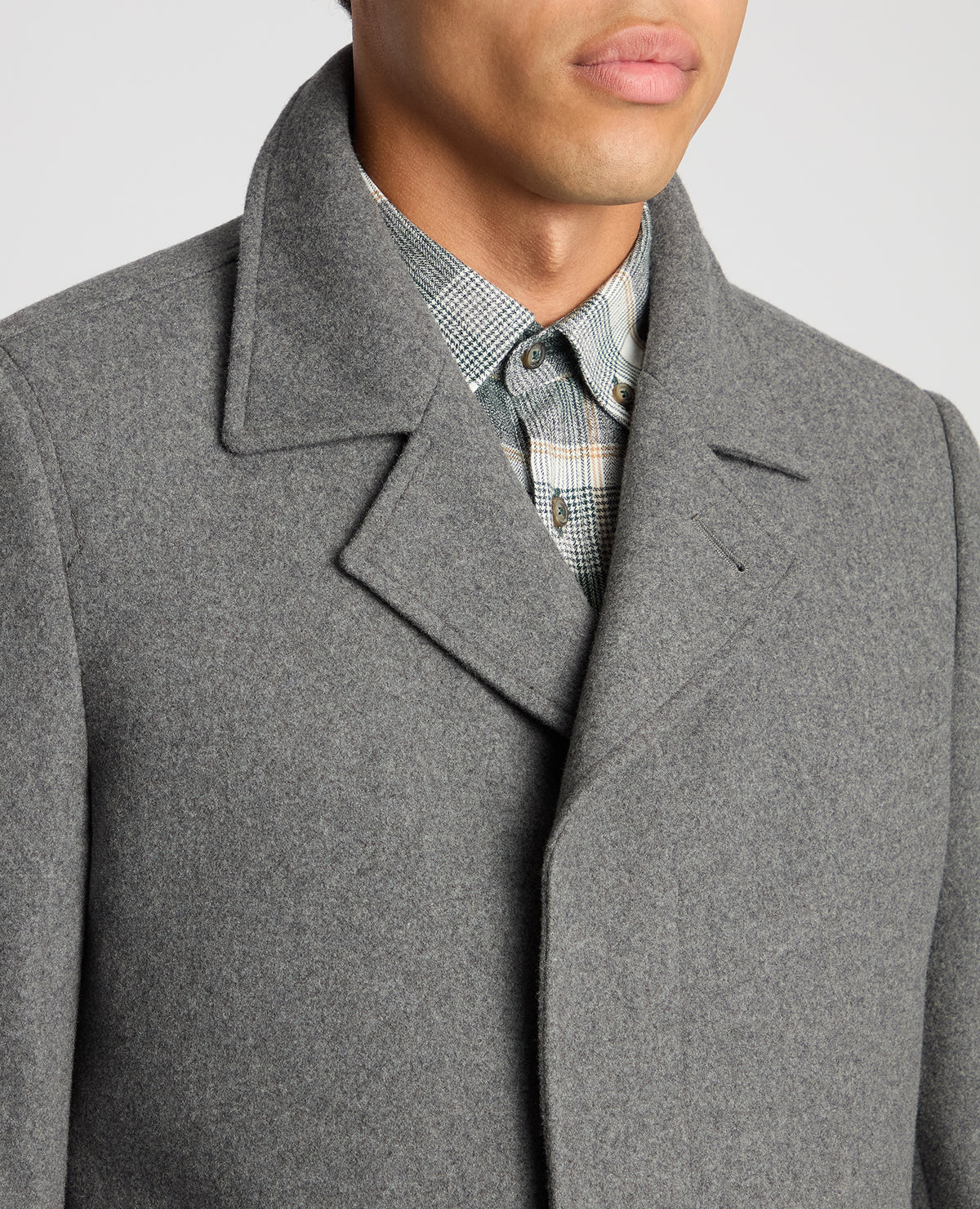 Man wearing a grey Tailored Fit Overcoat