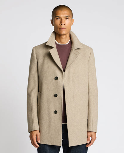 Man wearing a sand Lochlan Tailored Fit Wool Blend Overcoat