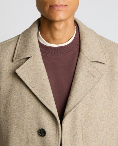Man wearing a sand Lochlan Tailored Fit Wool Blend Overcoat
