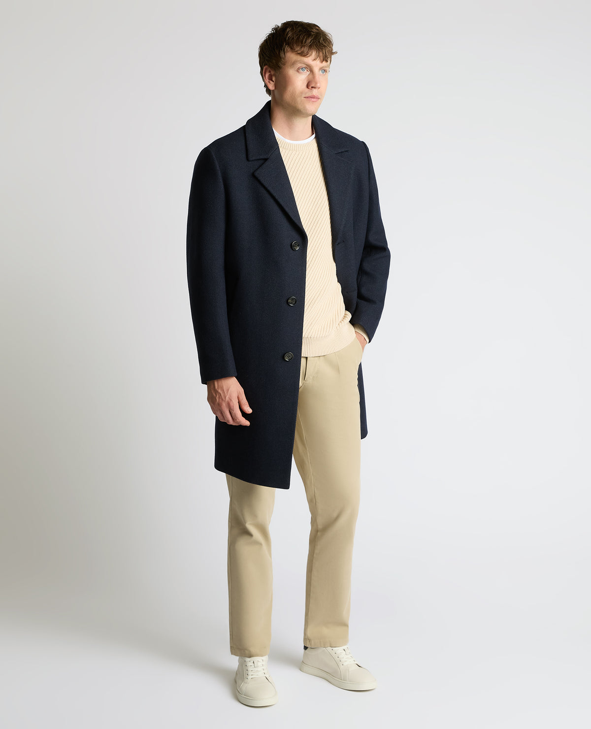 Man wearing a navy Dylan Relaxed Fit Wool Blend Coat