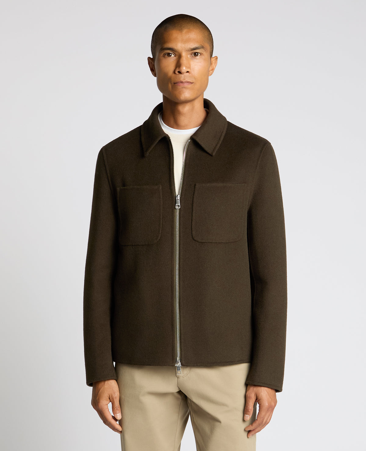 Man wearing a green Conrad Relaxed Fit Wool Rich Jacket