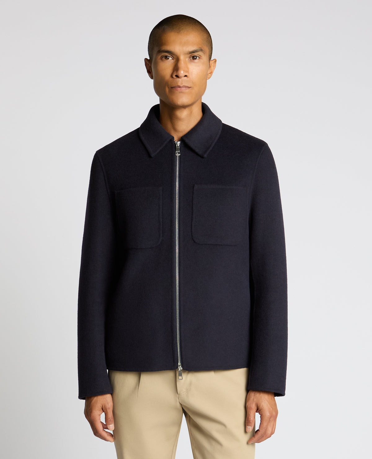 Man wearing a navy Conrad Relaxed Fit Wool Rich Jacket