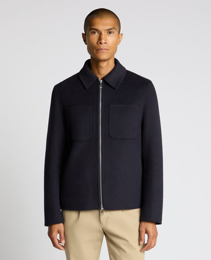 Man wearing a navy Conrad Relaxed Fit Wool Rich Jacket