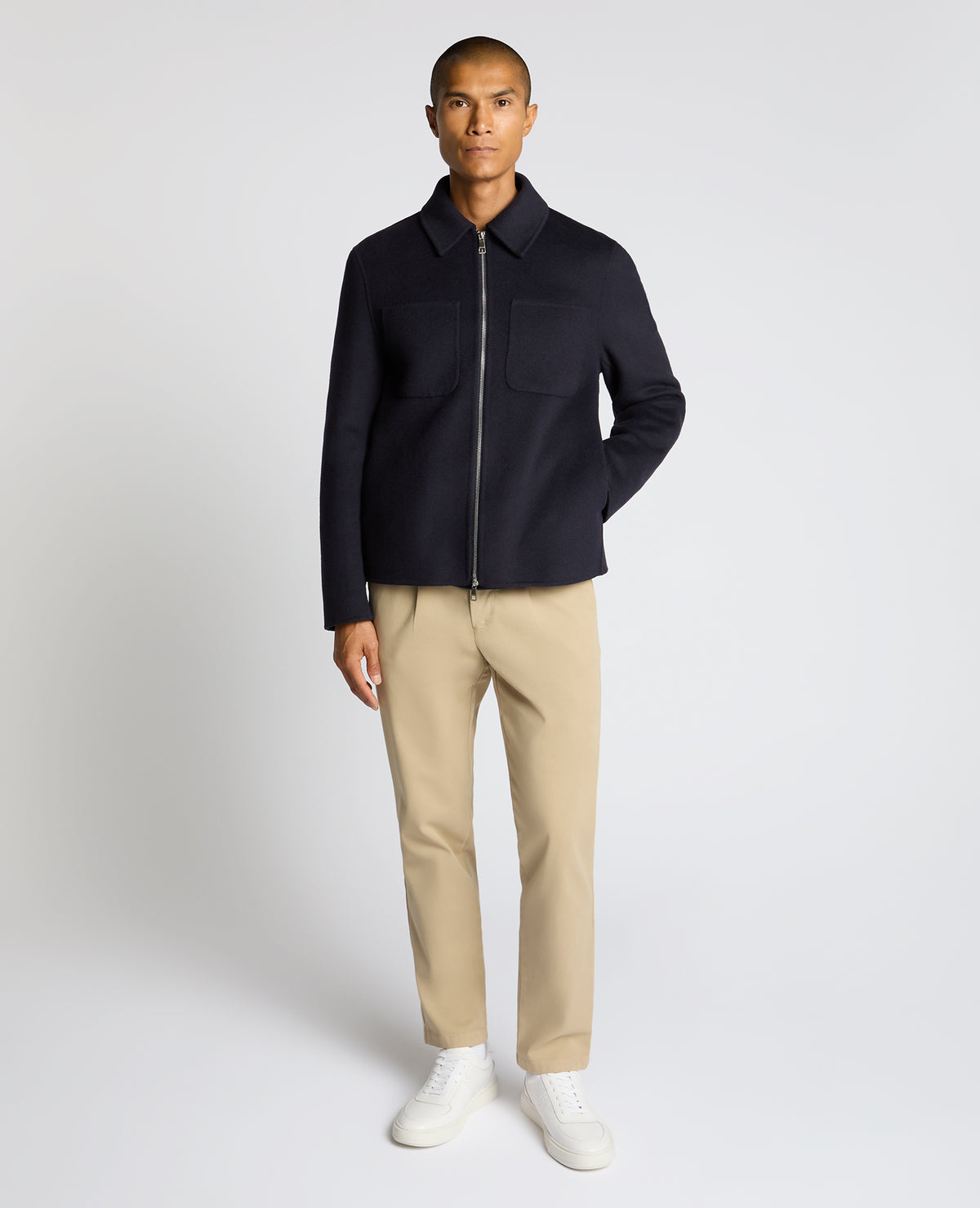 Man wearing a navy Conrad Relaxed Fit Wool Rich Jacket