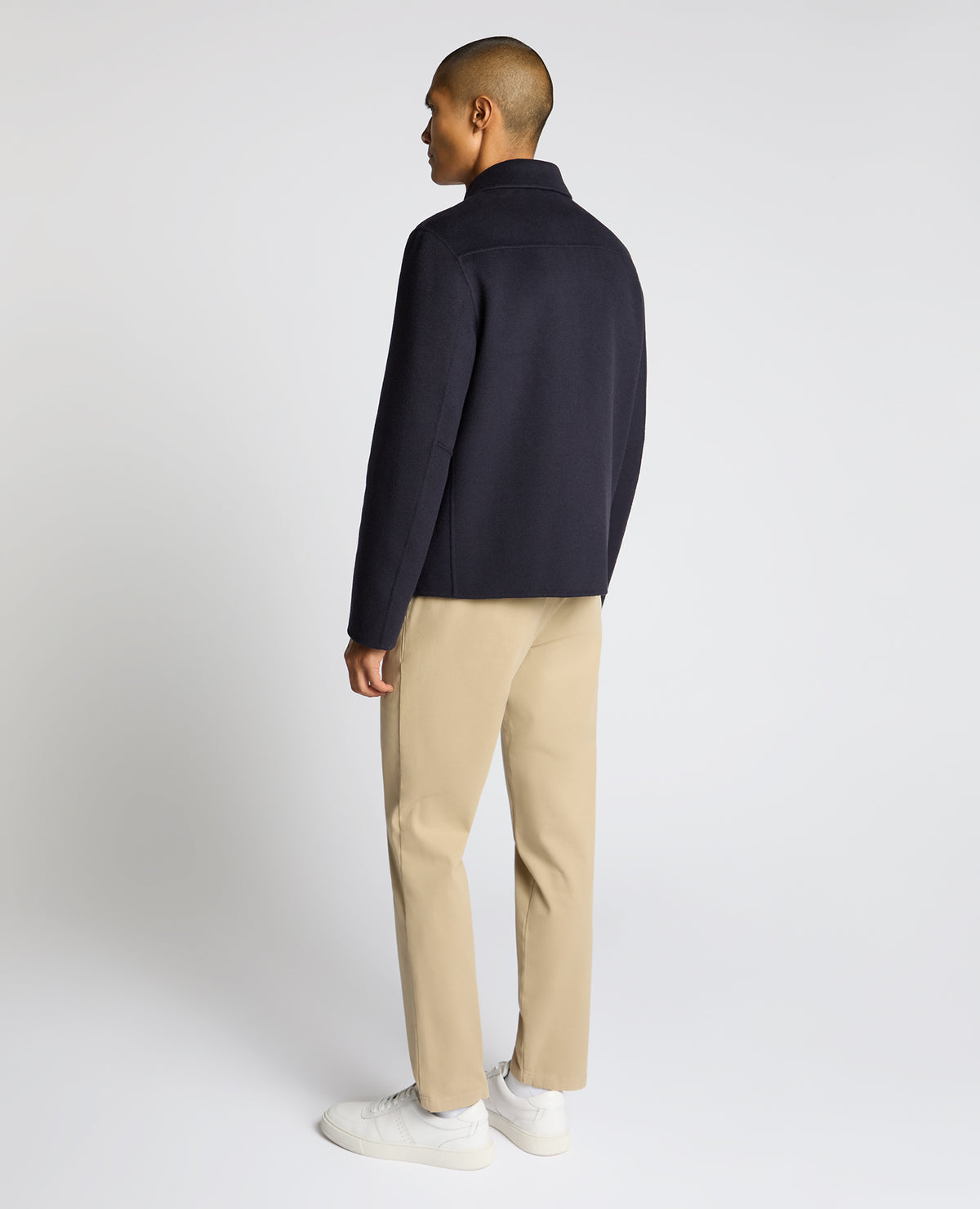 Man wearing a navy Conrad Relaxed Fit Wool Rich Jacket