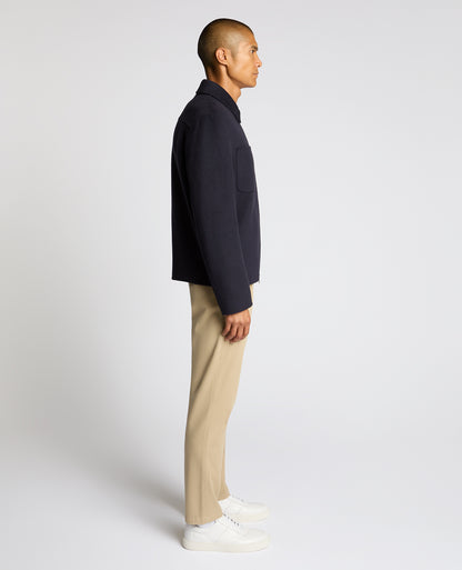 Man wearing a navy Conrad Relaxed Fit Wool Rich Jacket