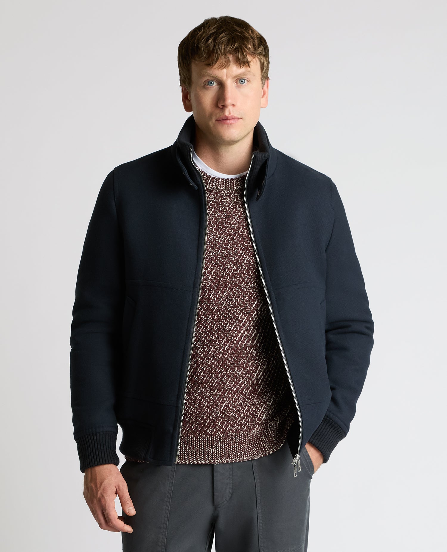 Man wearing a navy Braxton Regular Fit Twill Jacket