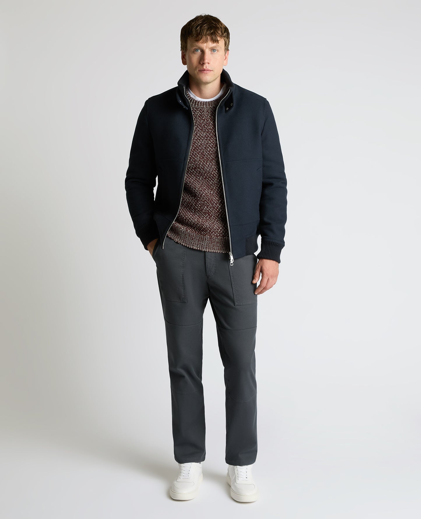 Man wearing a navy Braxton Regular Fit Twill Jacket