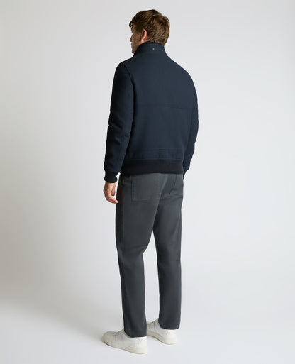 Man wearing a navy Braxton Regular Fit Twill Jacket