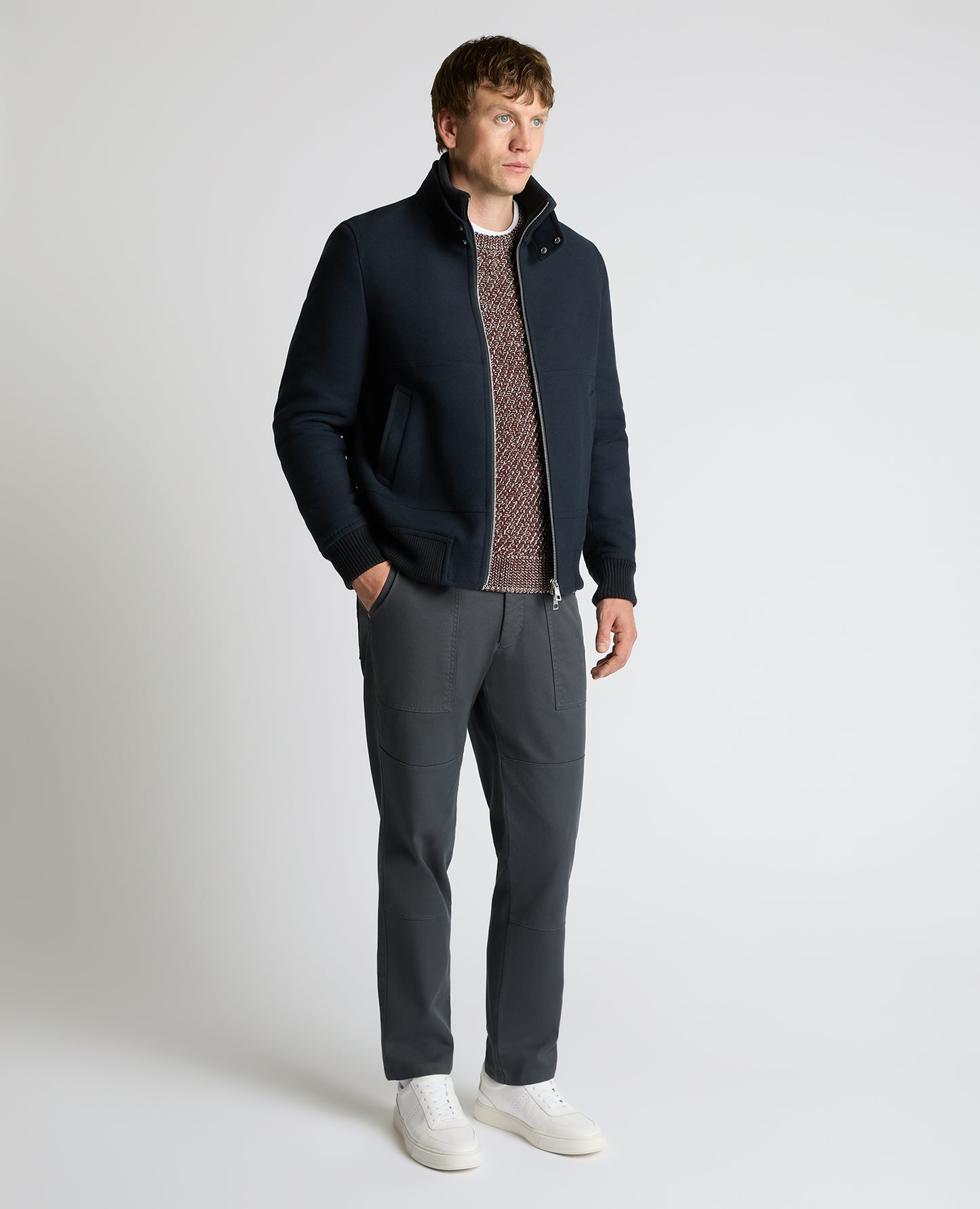 Man wearing a navy Braxton Regular Fit Twill Jacket