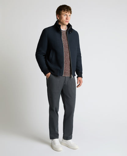 Man wearing a navy Braxton Regular Fit Twill Jacket