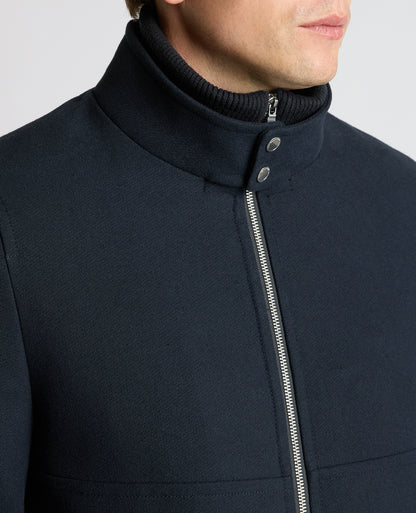 Man wearing a navy Braxton Regular Fit Twill Jacket