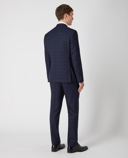 Man wearing a navy Tapered Fit Checked Wool Rich Mix and Match Suit
