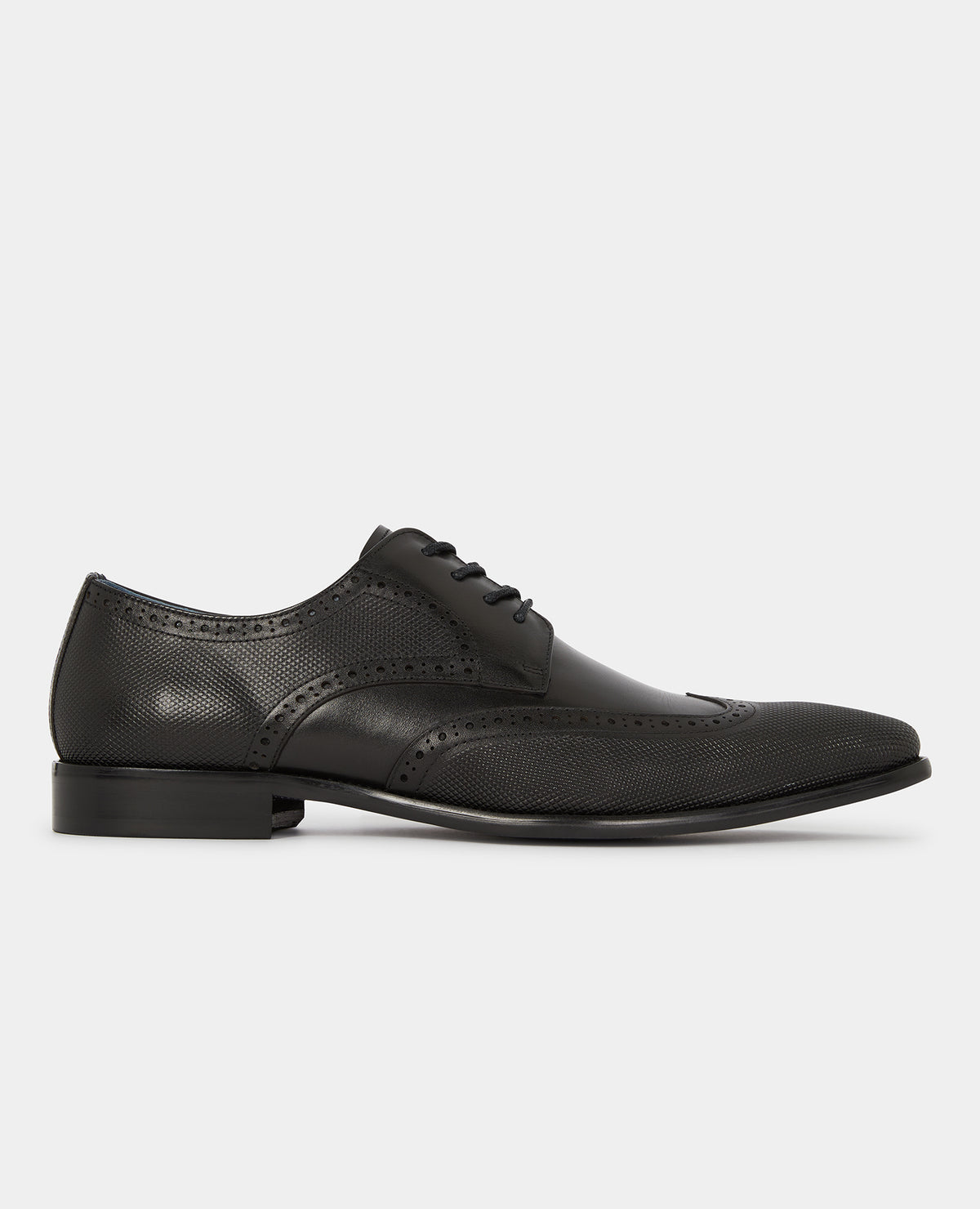 Man wearing a black Leather Russo Shoe