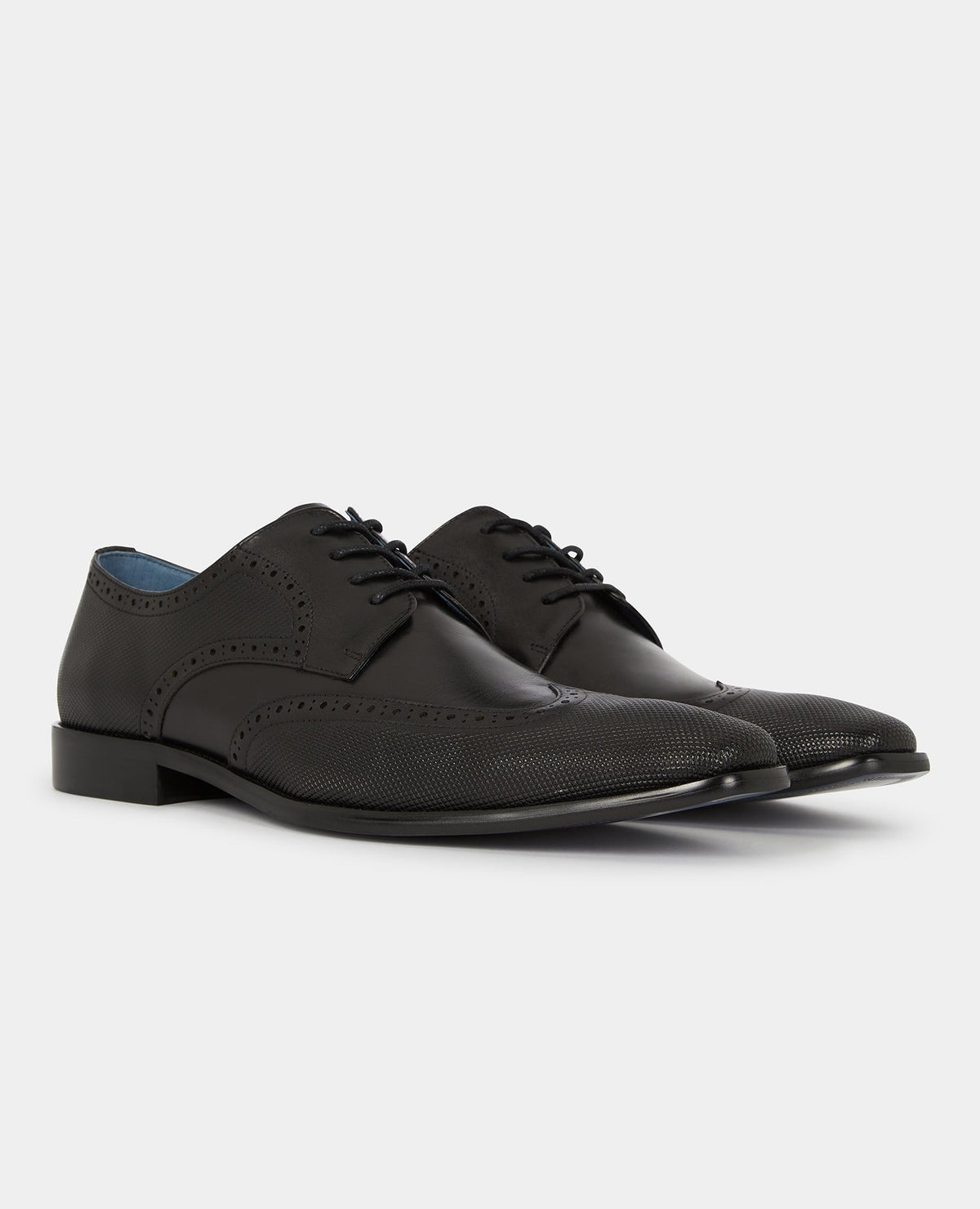 Man wearing a black Leather Russo Shoe
