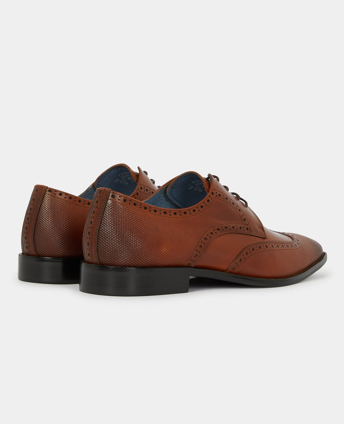 Man wearing a orange Leather Russo Shoe