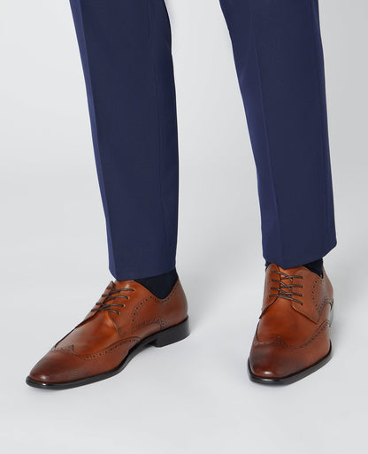 Man wearing a orange Leather Russo Shoe