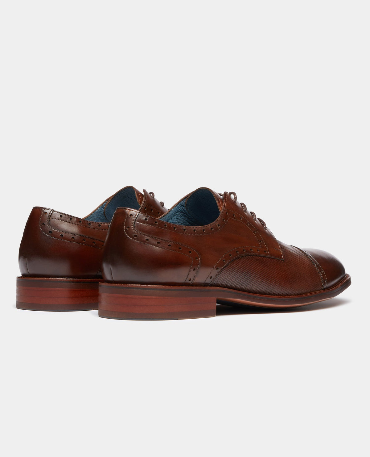 Man wearing a orange Leather Derby Shoe