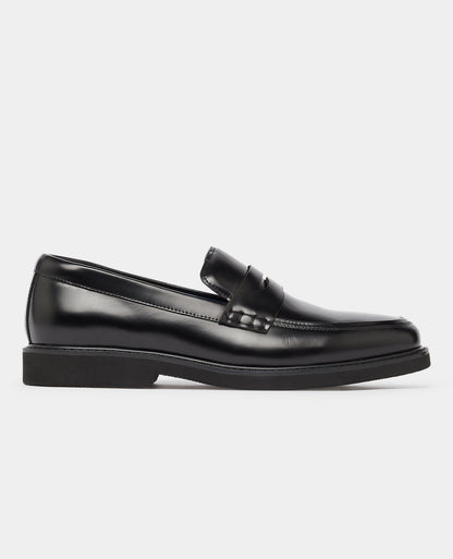 Man wearing a black Leather Slip On Loafer