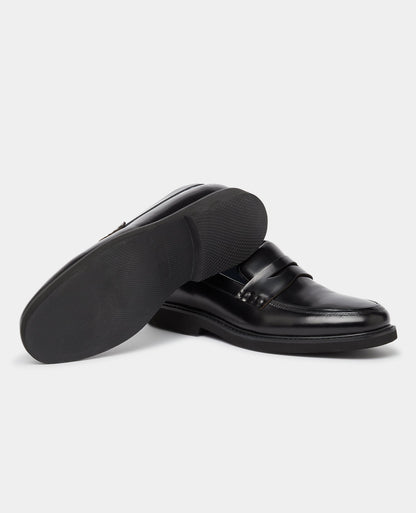 Man wearing a black Leather Slip On Loafer