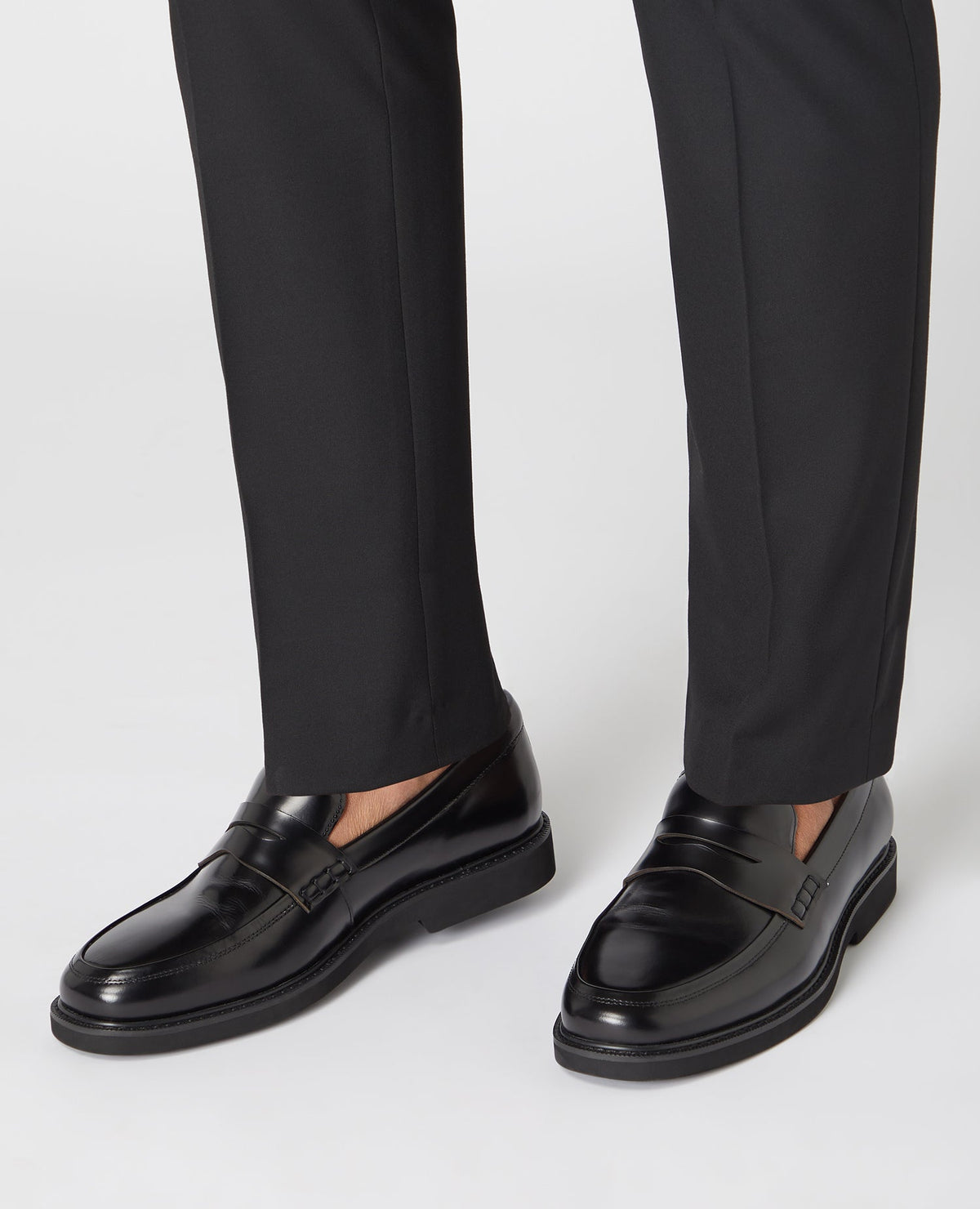 Man wearing a black Leather Slip On Loafer