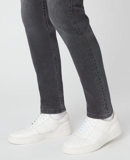 Man wearing a white Leather Trainer