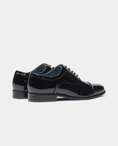 Man wearing a black Leather Prato Shoe