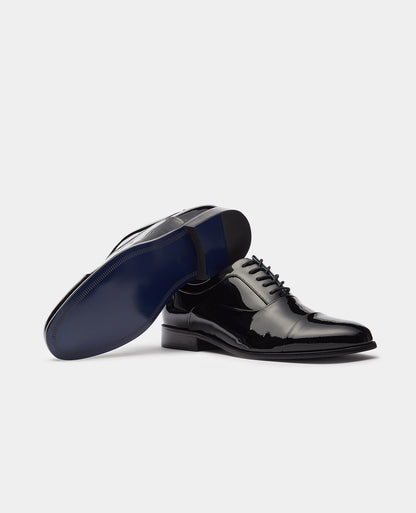 Man wearing a black Leather Prato Shoe
