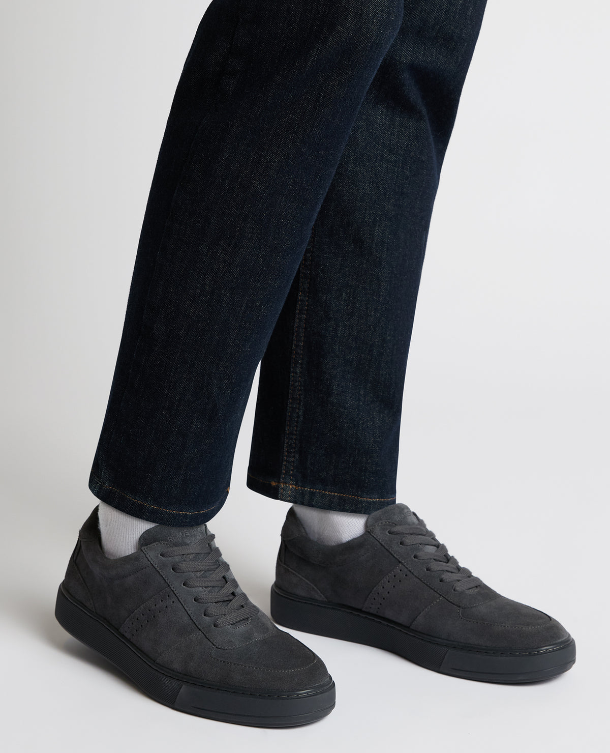 Man wearing a grey Charcoal Grey Suede Trainer