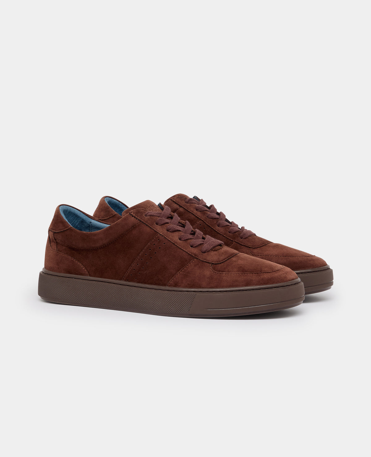 Man wearing a brown Suede Enrico Trainer