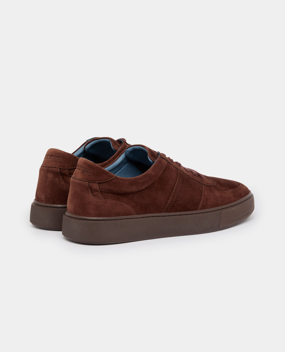 Man wearing a brown Suede Enrico Trainer