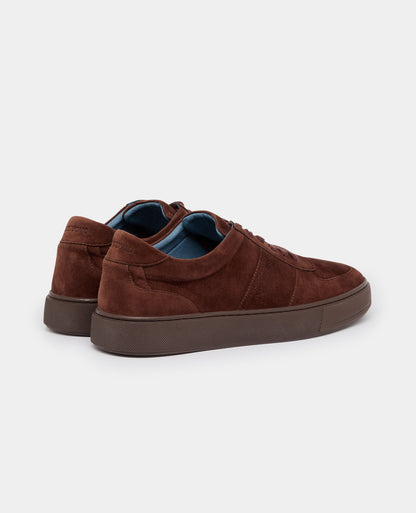 Man wearing a brown Suede Enrico Trainer