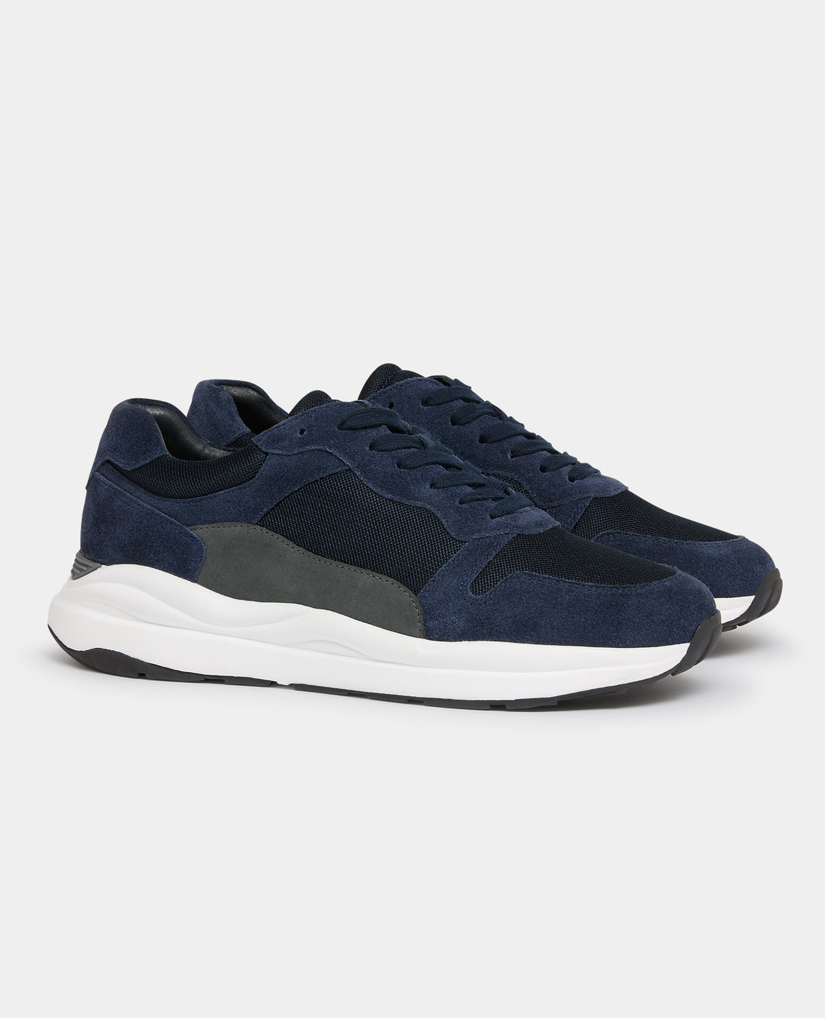 Man wearing a navy Suede Albi Trainer